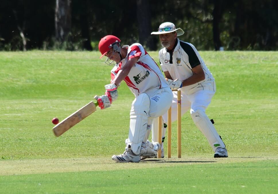 Michael Ying Sing goes on the attack for RSL-Colts on Saturday. His century has put his side in a commanding position heading into day two of the match. 				        Photo: BROOK KELLEHEAR-SMITH