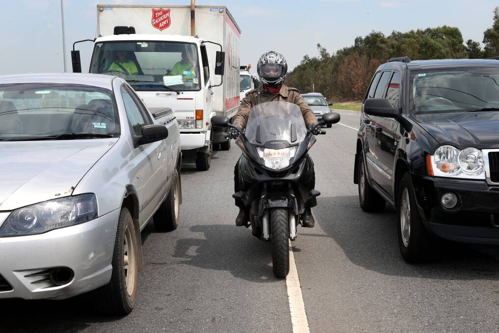 YES HE CAN: It is now legal for motorcyclists in NSW to overtake through the middle of slow-moving traffic.