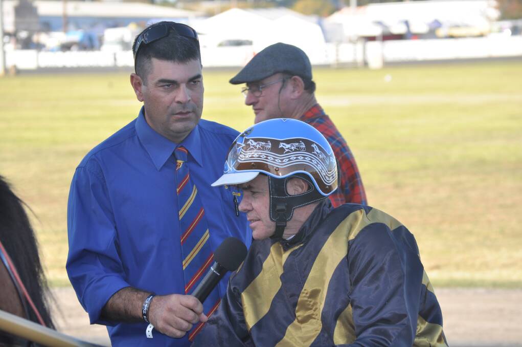 Steve Dowton chatting with Martin Simmons after winning a race on last week's Carnival of Cups program at Dubbo.