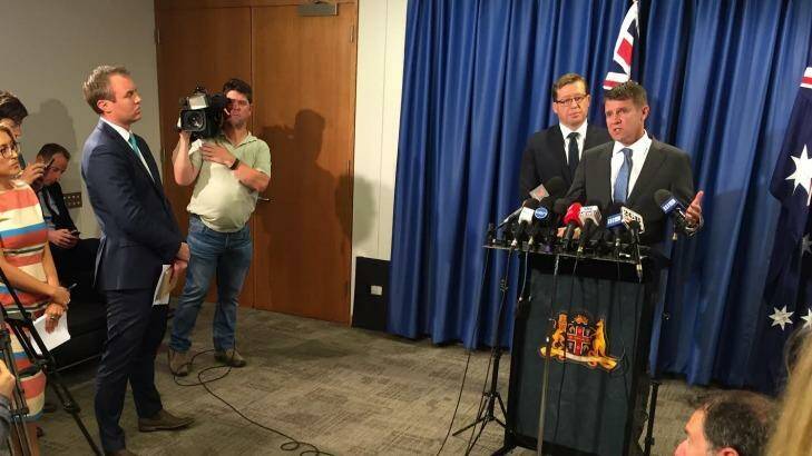Mr Baird and Mr Grant at the media conference on Tuesday.  Photo: Wolter Peeters