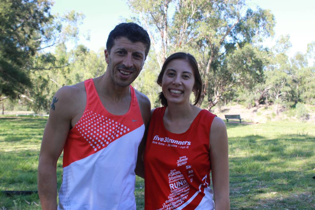 Olympian Youcef Abdi with Dubbo parkrun event director Miriam Tan for the special Valentine's Day run. 		     Photo: JENNIFER HOAR