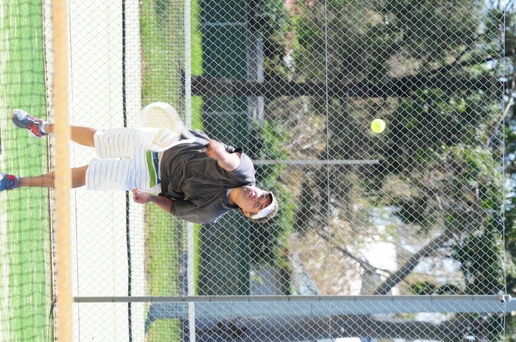 Mark Toomey in action at the Muller Parkl Tennis Club's Grahame Priest and Warren McLennan Charity Day. Photo: GREG KEEN