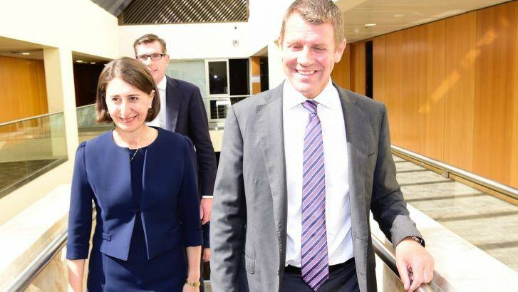 Outgoing Premier Mike Baird and incoming Premier Gladys Berejiklian arrive for the Liberal Party meeting. Photo: Wolter Peeters