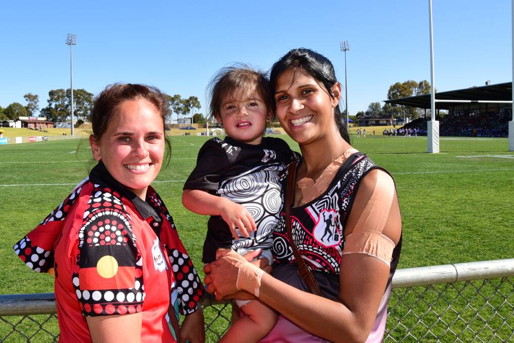 Having a great time at the Koori Knockout on Friday was Kempsey player Katie Shaw, Makseedi Simon and Redfern player Latai Simon. The action continues on Saturday, Sunday and Monday. 									      
Photo: BELINDA SOOLE