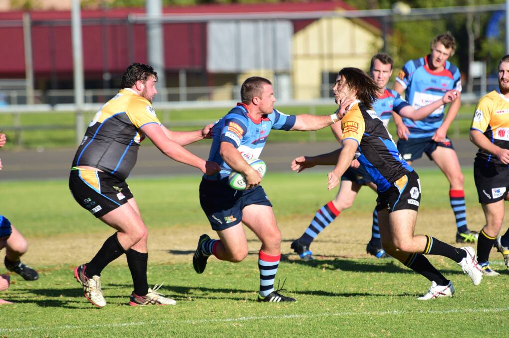HEY BIG FENDER: The Dubbo Kangaroos will be hoping to see more of this kind of attack from flyhalf Simon Murphy at Cowra tomorrow. 			   Photo: CHERYL BURKE