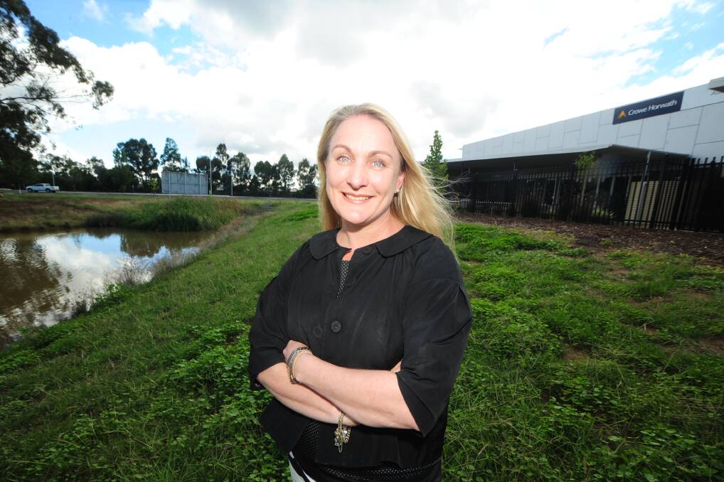 Dubbo-based managing principal of accounting and advisory firm Crowe Horwath in the central west Yvette Pietsch is encouraging other professionals to return to the country.										  Photo: BELINDA SOOLE