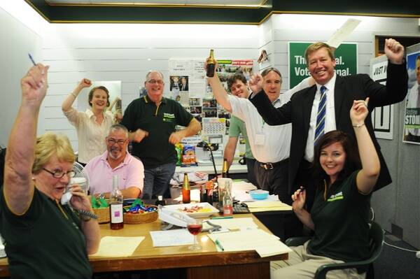 Kirby Dunlop, Steve Cowley, Mike Blake, Nathan Quigley, campaign director Peter Bartley and Dubbo MP-elect Troy Grant and Kathryn Wheeler celebrate at the 2011 election. Photo: BELINDA SOOLE