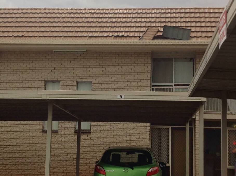 Tiles blown off a block of units in Central Dubbo.