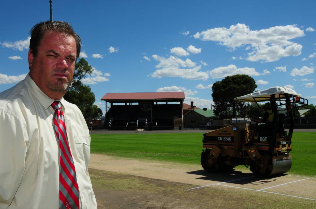 Dubbo and District Cricket Association president Mick Davis in front of the No. 1 Oval pitch being prepared for last night s Twenty20 match, the final game before the centre wicket square is replaced.	Photo: Greg Keen