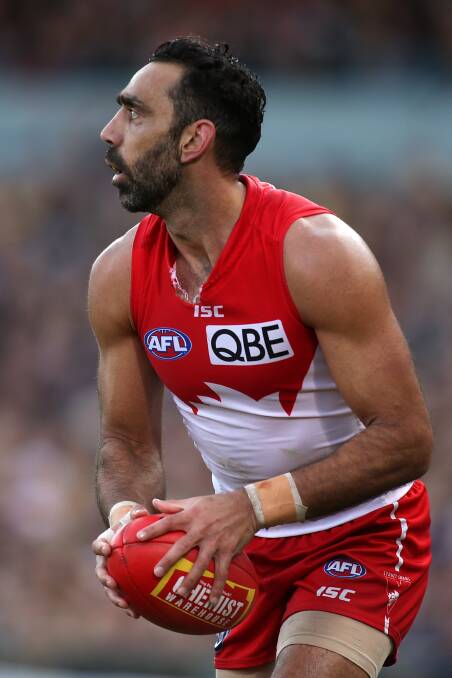 Adam Goodes looks to pass the ball during the round 17 AFL match between the West Coast Eagles and the Sydney Swans at Domain Stadium on July 26. 
 			     Photo: Paul Kane/Getty Images