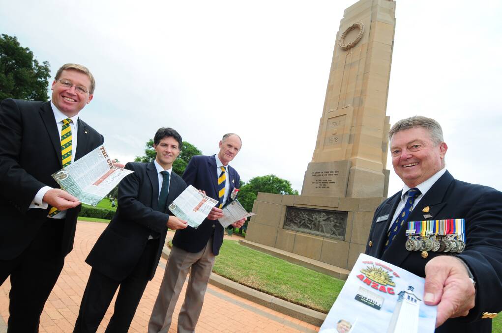 State Member for Dubbo Troy Grant gets a helping hand in launching The Spirit of Anzac from NSW Minister for Citizenship and Communities Victor Dominello in the company of ex-servicemen Greg Salmon and Tom Gray. 	Photo: LOUISE DONGES