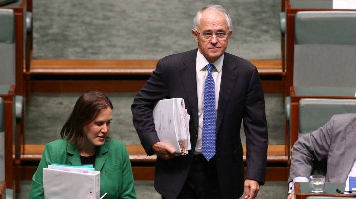 Prime Minister Malcolm Turnbull and minister Kelly O'Dwyer arrive for question time on Wednesday, Photo: Andrew Meares