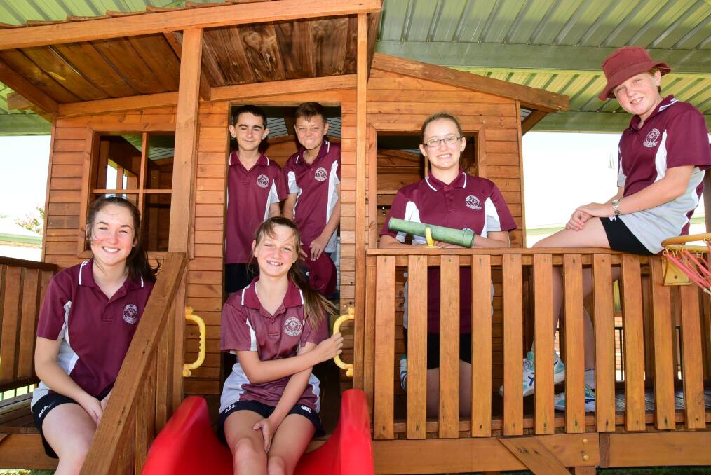 Dubbo Christian School year 7 students looking back on the start to their school journey are (back) Hayden Carroll and Elliot Barton, and (front) Isabella Nicholson, Grace Haddon, Naomi Clark and Emma Tomlinson. 	Photo: BELINDA SOOLE