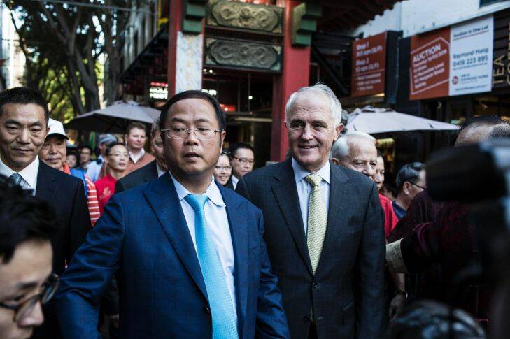 SYDNEY, AUSTRALIA - FEBRUARY 12: Xiangmo Huang and Prime Minister Malcolm Turnbull walk along dixon street before the official lantern lighting ceremony at Tumbalong Park on February 12, 2016 in Sydney, Australia. (Photo by Dominic Lorrimer/Fairfax Media)