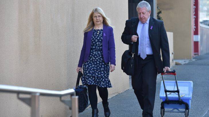 Faye Leveson (left) and Mark Leveson (right) arrive at the Glebe Coroners Court for the resumption of their son Matthew Leveson's inquest. 23rd August, 2017. Photo: Kate Geraghty
