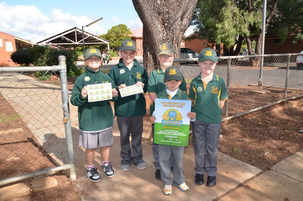 Dubbo North Public s Ebony Midgley, Genevieve Campbell, Jacob Coady, William Clarke and Jahrome Hall, taking part in the National Walk Safely to School Day.