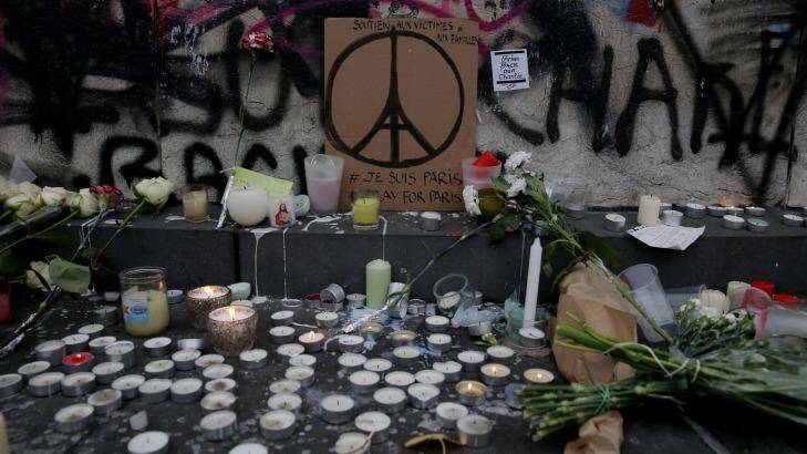 Tributes at Place de la Republique in Paris after attacks killed at least 129 people. Photo: Andrew Meares