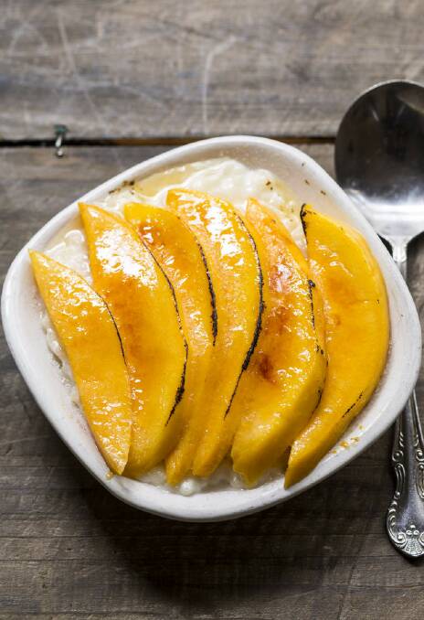 Rice pudding is a simple sweet and this is a summery spin with mango brulee from Frank Camorra <a href="http://www.goodfood.com.au/good-food/cook/recipe/mango-rice-pudding-brulee-20140114-30sn0.html?rand=1421385920568"><b>(recipe here).</b></a> Photo: Marina Oliphant