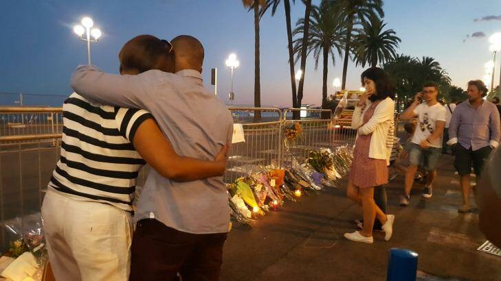 People join the tributes on the Promenade des Anglais in Nice. Photo: Latika Bourke