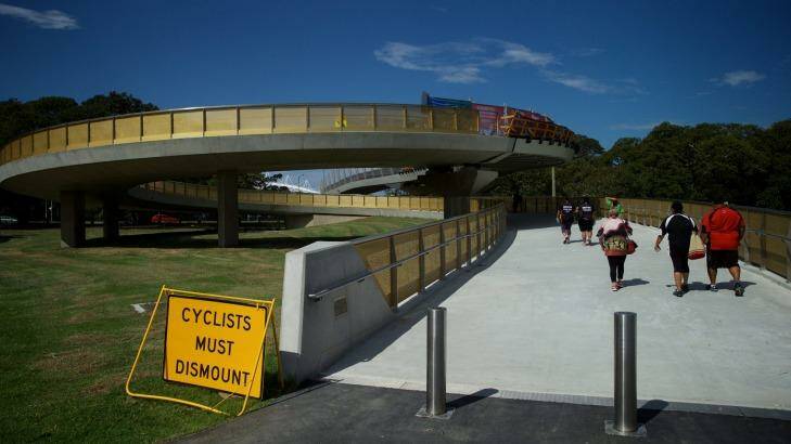 Pedestrians use the Albert Tibby Cotter Bridge over Anzac Parade, but bigger plans are mooted for Moore Park. Photo: Wolter Peeters
