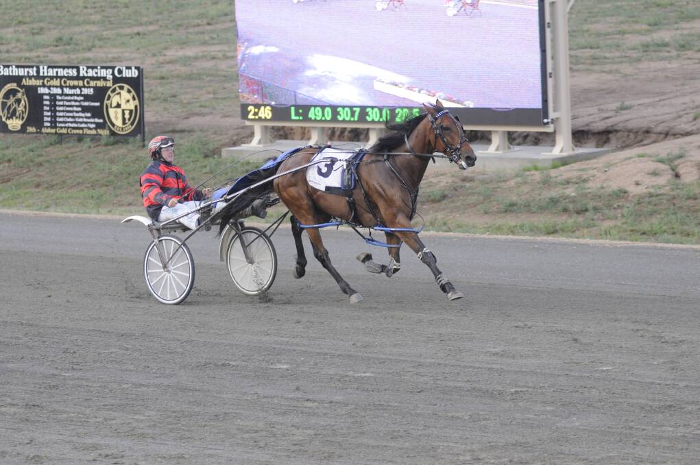Dubbo s Karloo Ten Seventy, pictured with driver Robert Morris, goes into tonight's Soldier s Saddle final after a strong win in the heats. 
 Photo: CHRIS SEABROOK