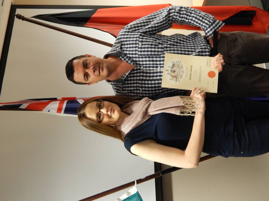 New Australian citizen Donna Wall with her fiance Bryant Donlan. Photo: STEPHANIE KONATAR.
