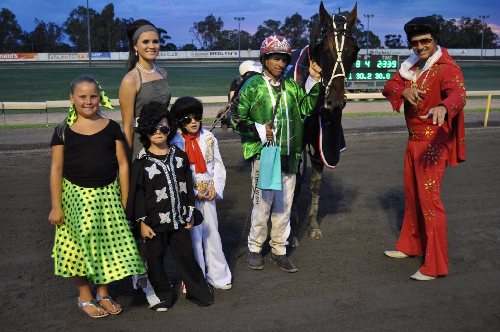 Nathan Hurst drove Padabing Stride to victory in the Elvis Series Final at Parkes on Wednesday night and he is pictured after the presentation with Mackenzie Wilkie-Smith, Sarah Jones, Brodie Easey, Lachlan Plummer and Greg Jones.