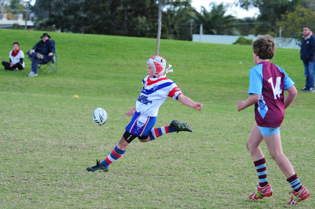 Finnley Neilsen puts boot to ball during one of the earler matches in the day.