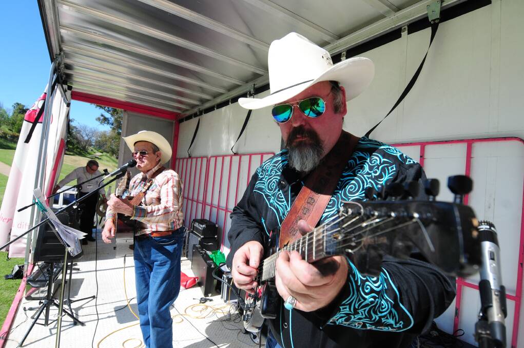 Garry Gowans and Mal Norton on stage during Saturday's country music concert. 					        Photo: GREG KEEN