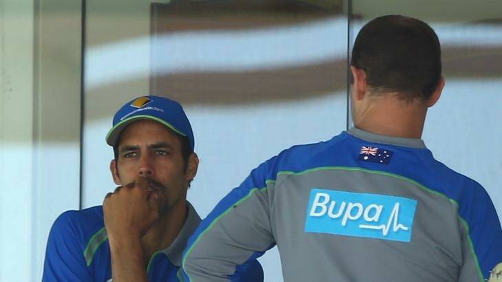 Bowing out: Mitchell Johnson looks on during the last day of the second Test. Photo: Robert Cianflone