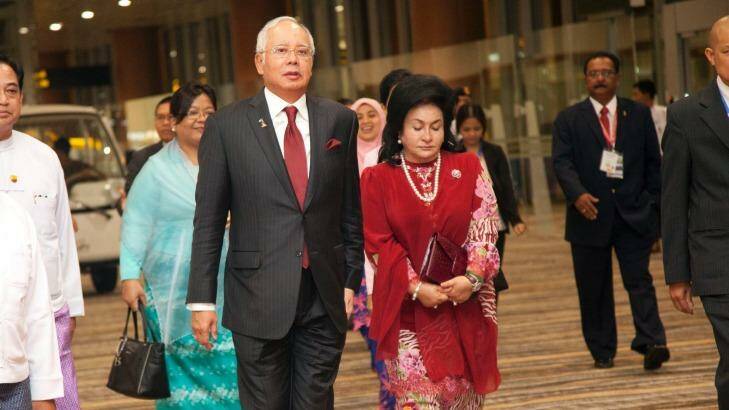 Malaysia's Prime Minister Najib Razak walks with his wife, Rosmah Mansor.  Photo: Khin Maung Win