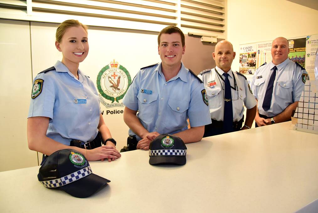 New probationary constables Rebecca Sutton and Alexander McLean are shown the ropes on their first day by Orana Local Area Command Inspector Dan Skelly and Acting Inspector Andrew McKittrick at Dubbo Police Station. 	      Photo: BELINDA SOOLE
