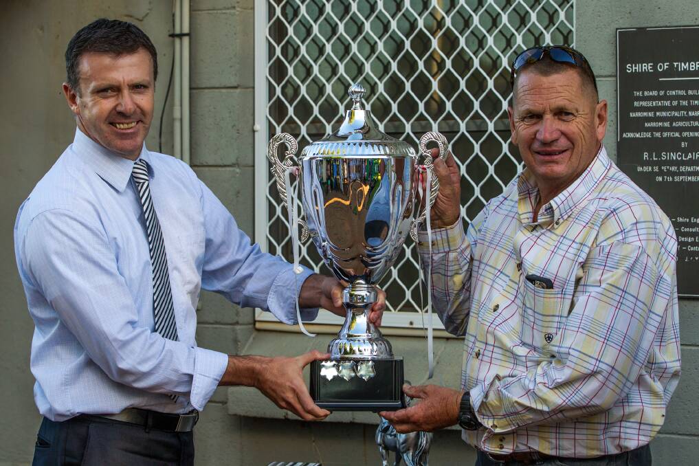 Scott Kennedy from Racing NSW with Howdiddydoit's trainer Don Robb.