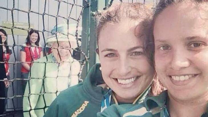 Hockeyroo stars Jayde Taylor and Brooke Peris take a selfie which the Queen photo bombed. Photo: Twitter