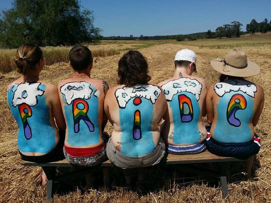 Bron Powell, Nicholas Steepe, Sharon O Reilly, Tanya Wheatland, and Caitlin promote Saturday s Pride March at Dubbo. They were body-painted by artist Tim Gratton.  
Photo: ELIZABETH MANSON