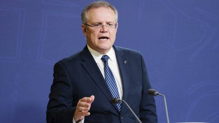 "Labor must support these savings measures, at the very least, as they included them in their own figures": Treasurer Scott Morrison Photo: James Brickwood