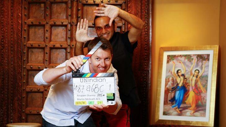 Director Anupam Sharma and Brett Lee who stars in <i>Unindian</i> at Govindas Restaurant in Sydney.  Photo: Janie Barrett