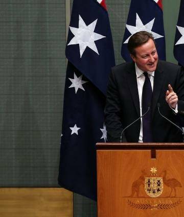 Mr Cameron joked he feared he was in for a "shirt-fronting" when he spotted Julie Bishop at a meeting in Italy last month. Photo: Alex Ellinghausen