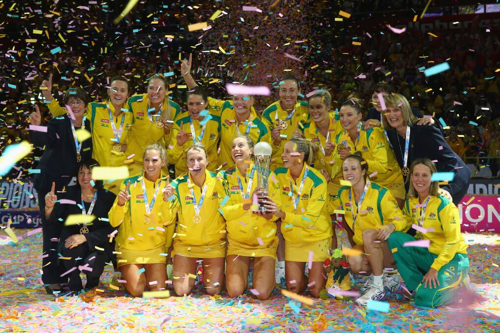 Australian Diamonds players celebrating their World Cup win on Sunday. 	Photo: GETTY IMAGES