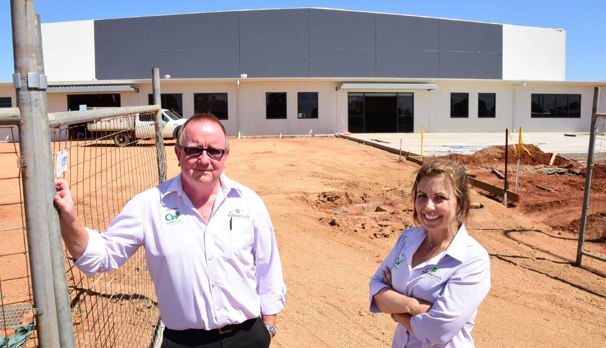 Midwest Foods managing director Damien Mahon and general manager/director Toni Alderdice view their new facility under construction in the BlueRidge Business Park. 		      Photo: BELINDA SOOLE