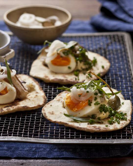Karen Martini's pita with crab egg, soft herbs and caperberries <a href="http://www.goodfood.com.au/good-food/cook/recipe/pita-with-crab-egg-soft-herbs-and-caperberries-20130124-2d8ar.html"><b>(recipe here).</b></a> Photo: Marina Oliphant