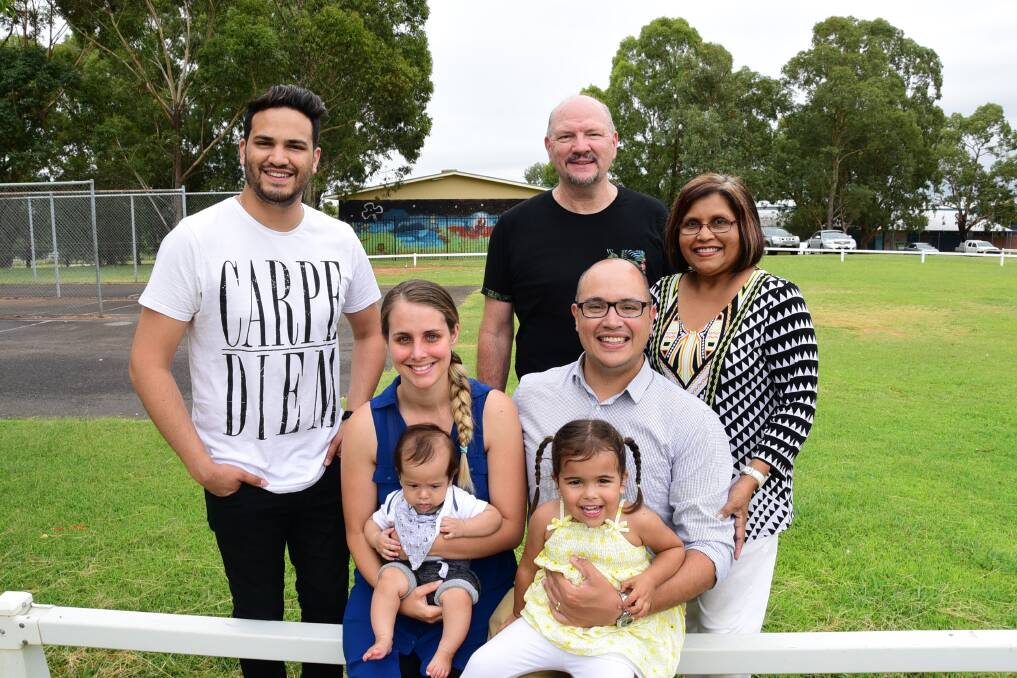 Nathan, Malcolm, Rhonda, Laura, Samuel, Azra (5 months) and Allegra (2 years) Shooter revisit the cricket nets at South Dubbo Oval, where Samuel almost died 20 years ago.  
Photo: BELINDA SOOLE