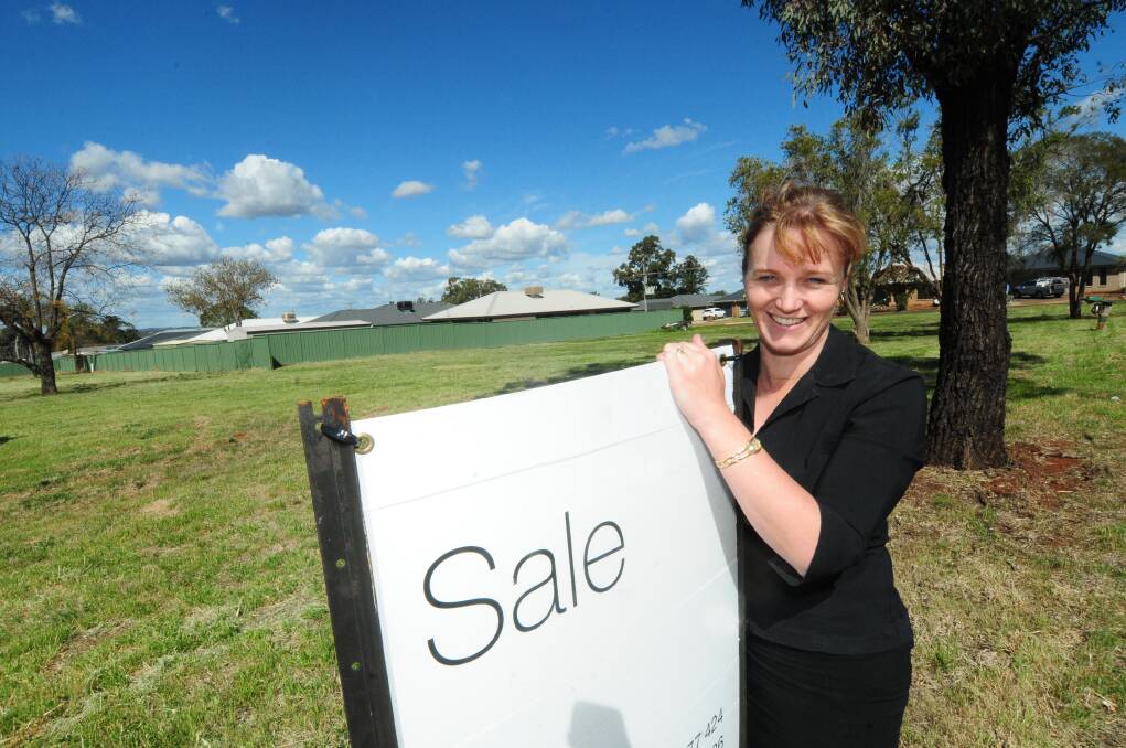 Selling agent Penny Browning with some of the vacant land available for sale in Dubbo s Rosewood Grove. 
Photo: LOUISE DONGES