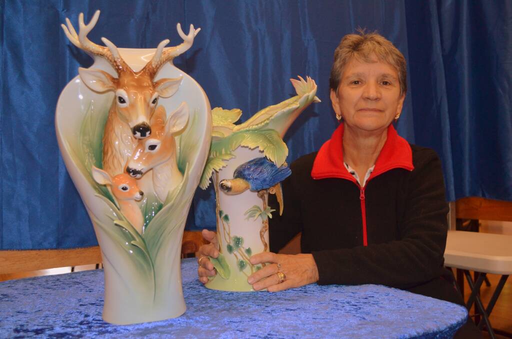 Queensland-based June Craswell with fine porcelain by Franz that will be available at the Dubbo Antiques and Collectables Fair.  
Photo: contributed