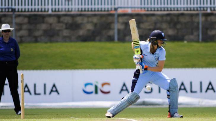 All-round talent: Ellyse Perry hits out for NSW.  Photo: Rohan Thomson