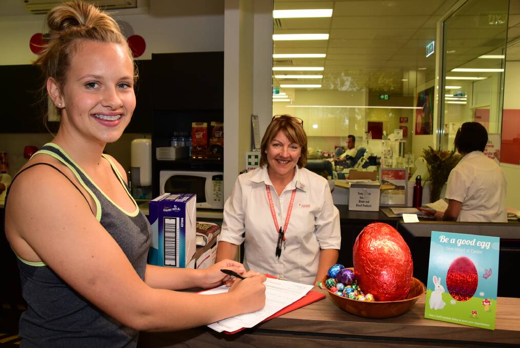 Liesl Fretwell and Dubbo Blood Centre manager, Debbie Amos, getting into the Easter "good egg" spirit.  
 
    Photo: BELINDA SOOLE