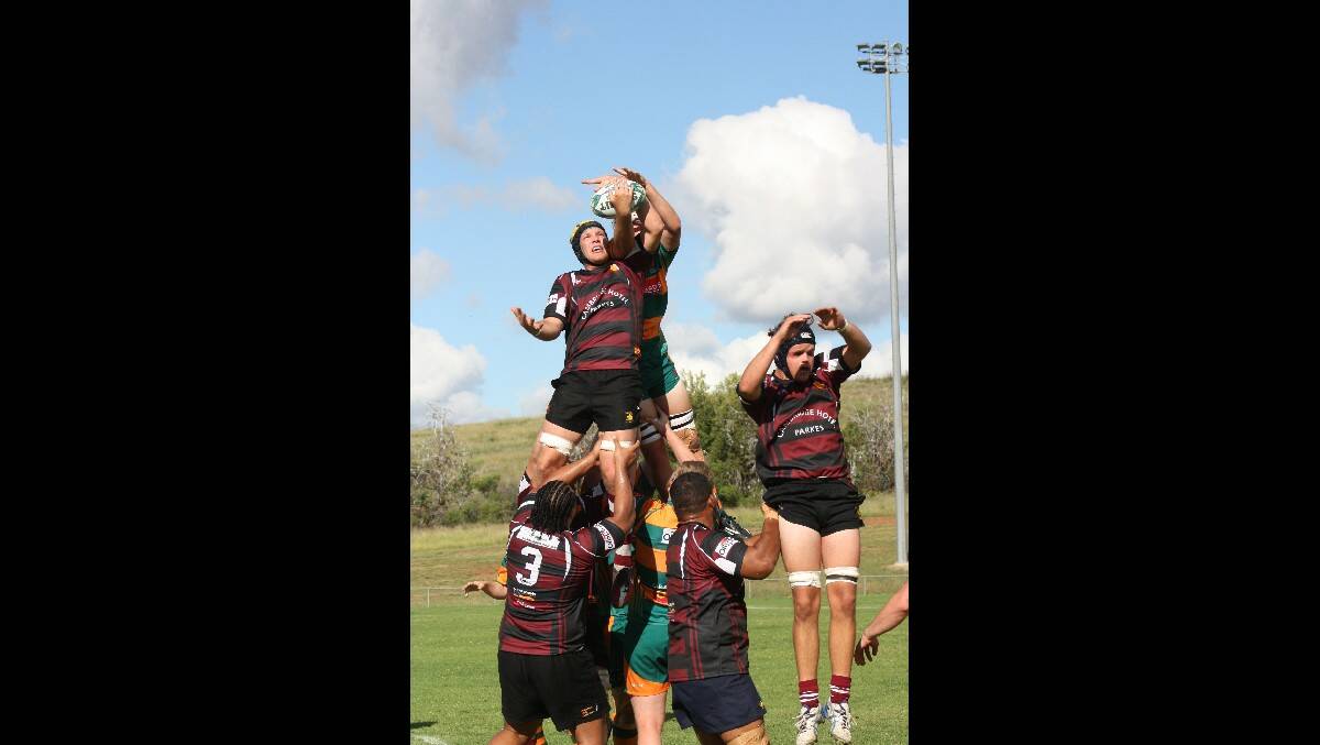 PARKES BOARS: The Boars and Lions compete for possession from a line out. Photo: MICHELLE COOK