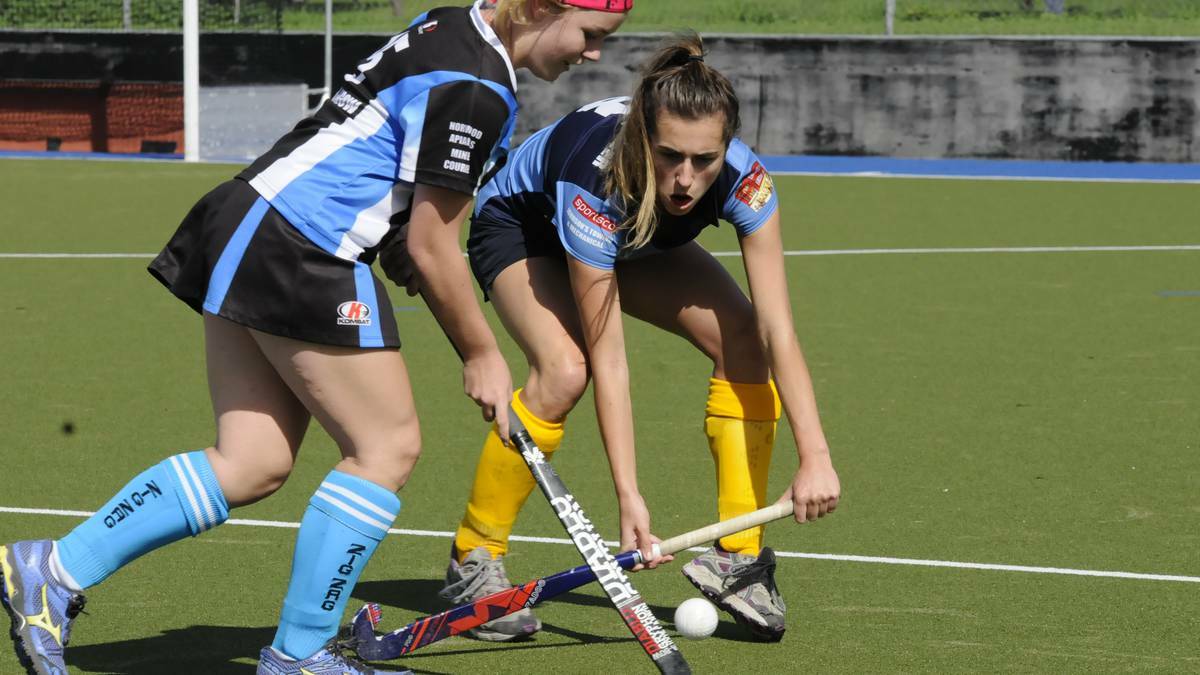 SOUTH TO VICTORY: Bathurst Souths' Steph Plunkett pays close attention to her Lithgow Zig Zag opponent during her side's 2-0 win in their round five women's Premier League Hockey game at the Cooke Hockey Complex on Saturday. Photo: PHILL MURRAY