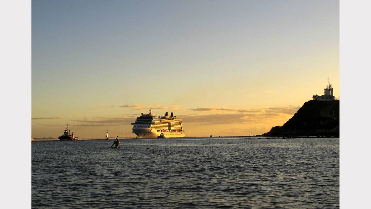 Celebrity Solstice enters the Port of Newcastle at sunrise. Picture: Darren Pateman