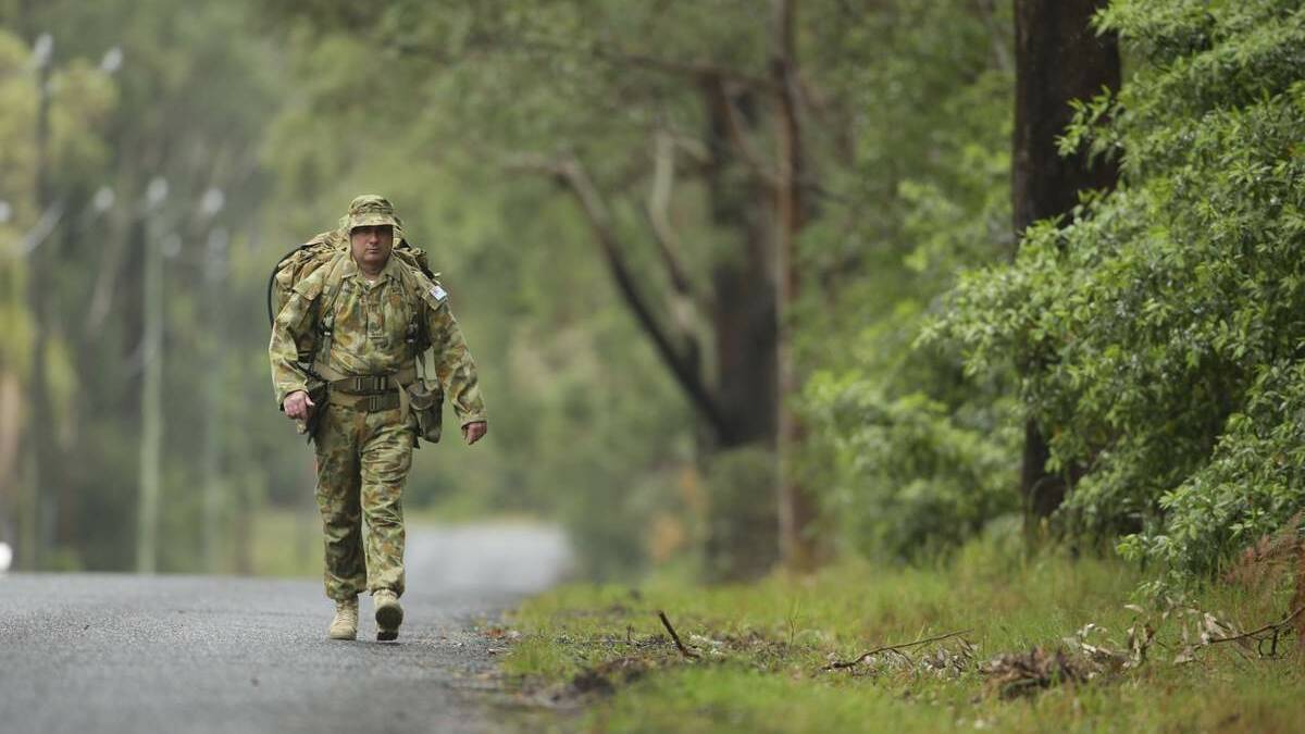 Corporal Andrew Summers of Medowie will walk to Sydney wearing a combat pack. Pictures: Peter Stoop